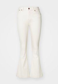 White flared jeans made of denim, featuring five pockets, a zip fly with a bronze button, and double-stitch detailing on the seams.