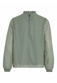 Zielona bluzka wykonana z lekkiego materiału, ozdobiona wzorem w zygzaki, z okrągłym dekoltem i marszczonymi mankietami; otwarcie w kształcie klucza z tyłu.