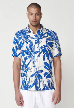 Short-sleeve shirt featuring a blue and white palm leaf print, button-down front, made of lightweight fabric, slightly relaxed fit.