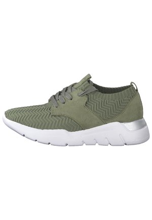 Olive green lace-up sneaker with chevron knit fabric, suede side panels, and thick white sole with silver heel detail.