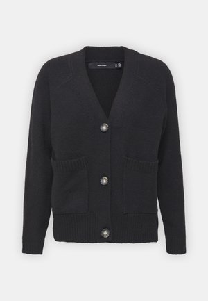 Svart cardigan laget av mykt strikket stoff, med V-hals, ribbede mansjetter, frontlommer og fire store knapper.