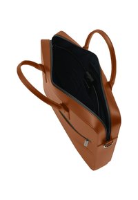 Brown leather tote bag with dual handles, partially unzipped top revealing black interior and zippered front pocket, shown at an angled view.