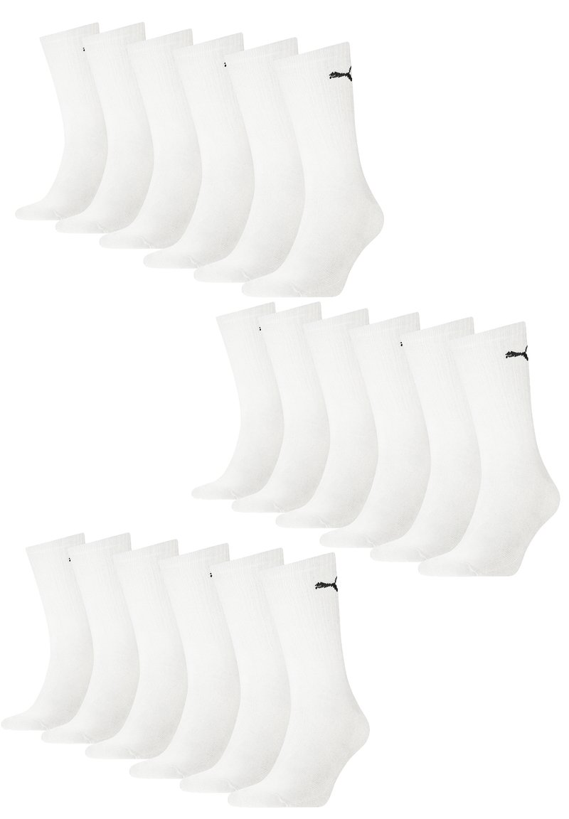 Weiße Baumwollsocken mit gerippter Struktur, versehen mit einem schwarzen Logo am Knöchel. Set aus 12 Paaren, angeordnet in zwei Reihen.