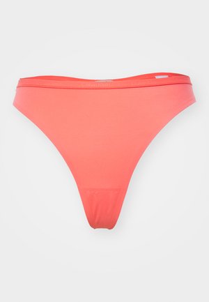 Korallfärgad bikiniunderdel med en mjuk tygkvalitet, minimalistisk design och en låg midjeresår som har Calvin Klein-logotypen.
