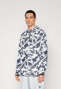 Felpa con cappuccio blu navy e bianca con un motivo astratto a pennellate, dotata di cordoncino, maniche lunghe e un logo del marchio sull'orlo.