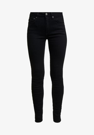 Fekete farmer skinny farmernadrág magas derékkal, elülső zsebekkel, egy kisebb érme zsebbel és fémből készült gombos záródással. Puha, rugalmas anyag.
