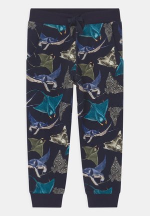 Pantaloni jogger blu navy con cintura elastica e coulisse, ricoperti da un motivo multicolore di varie mante e razze.