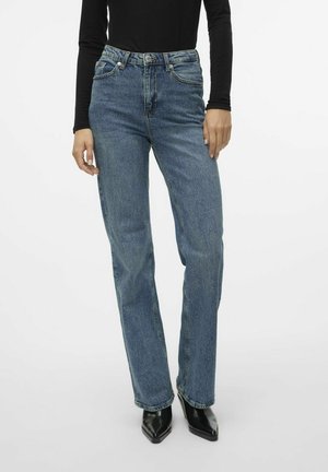 Platėjantys džinsai - medium blue denim