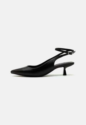 Black leather slingback pump with a pointed toe, low kitten heel, and a thin ankle strap secured by a buckle. Smooth texture with minimal detailing.