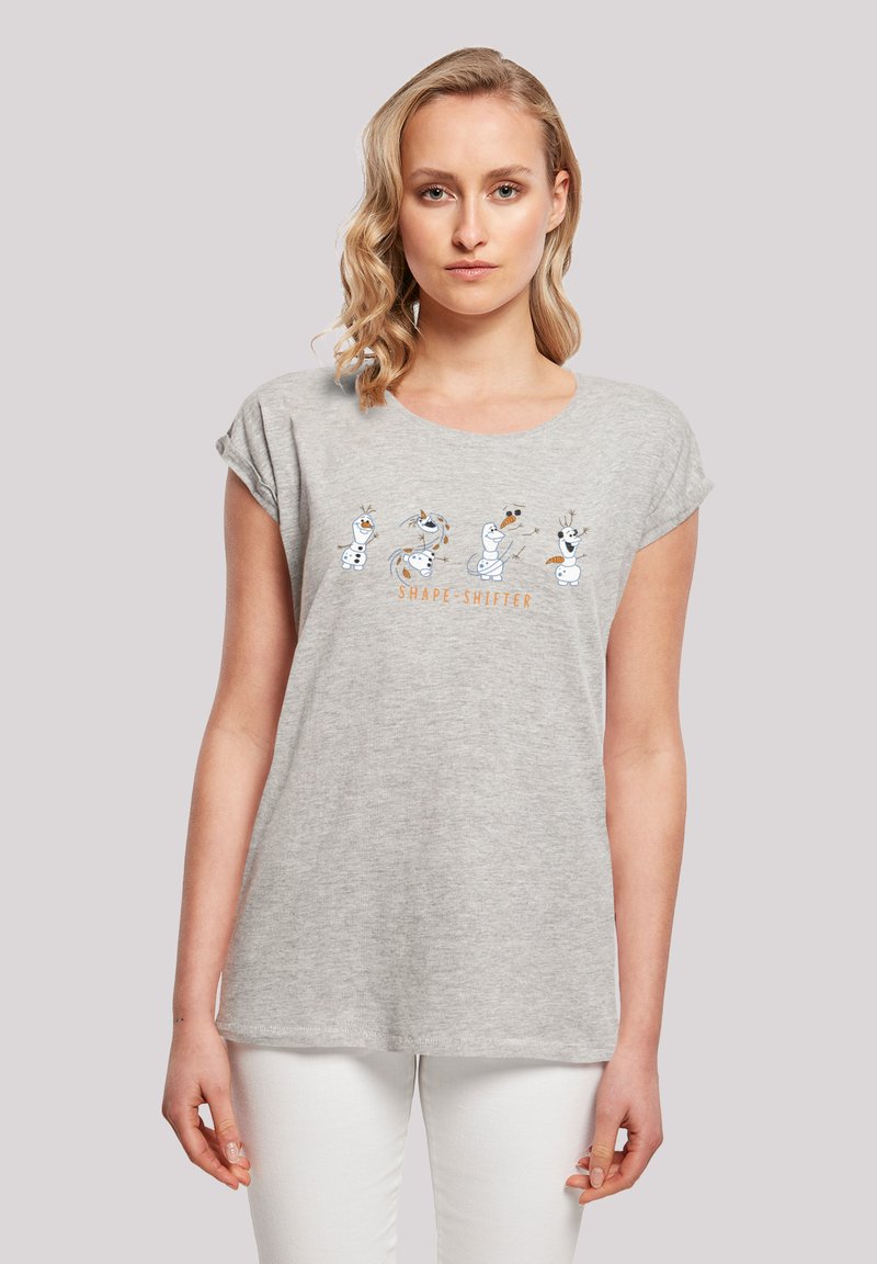 Grijze t-shirt met korte mouwen gemaakt van zacht materiaal, met een cartoon sneeuwpop ontwerp en de tekst "SHAPE-SHIFTER" in oranje.