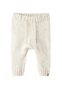 Pantalons en tricot crème avec des détails parsemés subtils, taille élastique, cordon de serrage et poignets côtelés. Texture douce et forme fuselée.