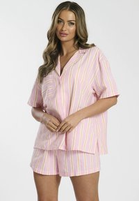 Pink striped short-sleeve shirt and matching shorts, featuring horizontal stripes in yellow and white. Made of lightweight fabric with buttons.