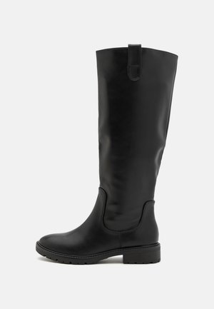 Black knee-high boots made of smooth leather, featuring a wide shaft, elastic side panels, and a textured rubber sole for grip.