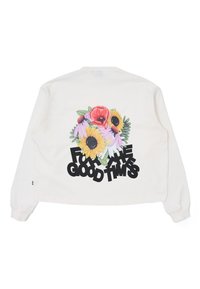 Langärmliger weißer Pullover mit einem floralen Design aus Sonnenblumen, Mohnblumen und einem schwarzen Grafiktext "For the Good Times" auf der Rückseite.