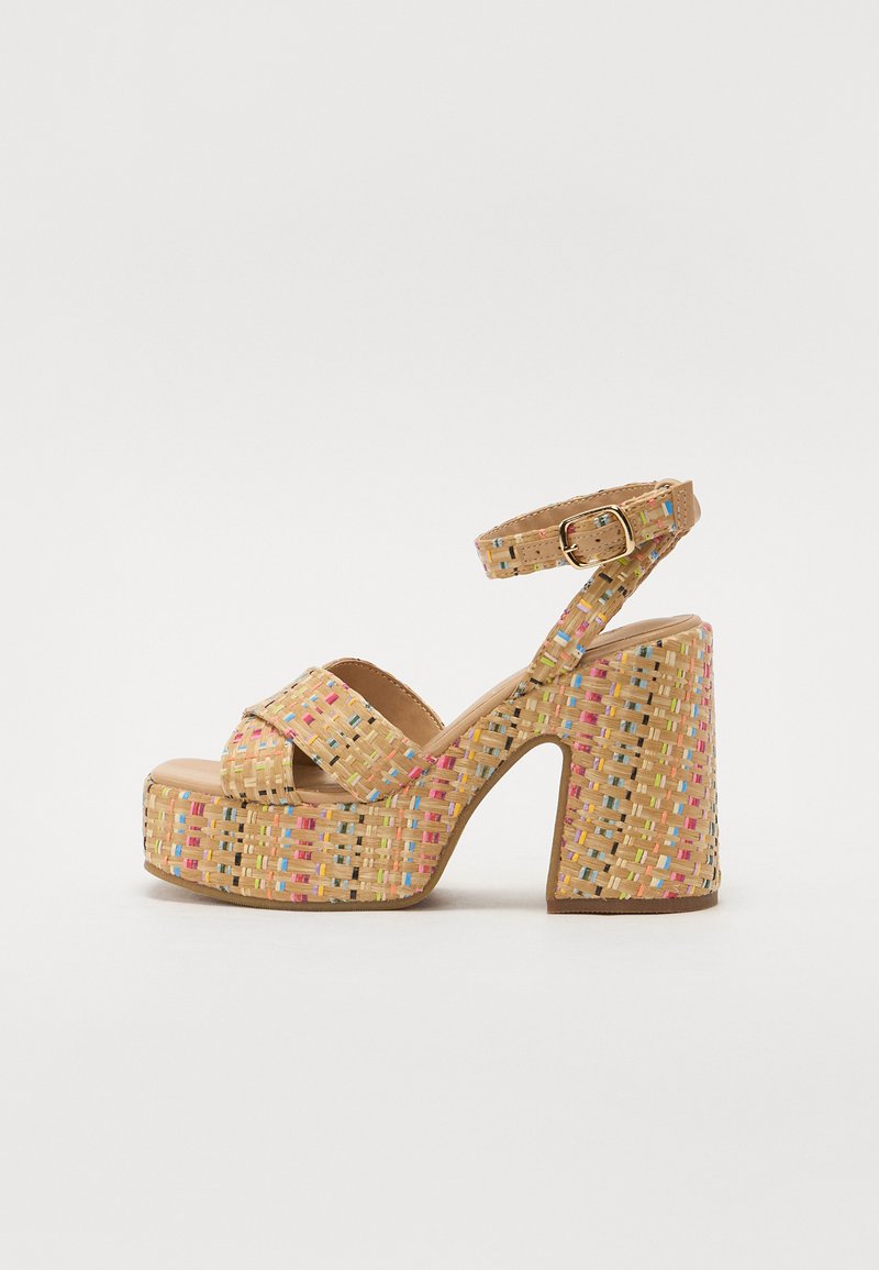 Woven platform sandals with a chunky heel, in beige with colorful accents. Adjustable ankle strap and textured surface for grip.