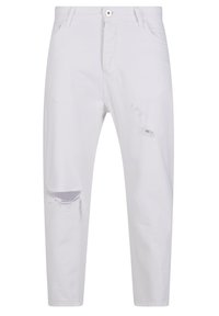 Valged denimpüksid kitsas lõikes, millel on suur rebend vasakul põlvel, traditsiooniline viie tasku disain ja nööbi kinnitusega.