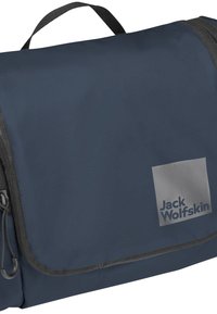 Sac d'épaule Jack Wolfskin bleu marine avec bordure noire, rabat avant, poignée de transport et logo de la marque en bas à droite.