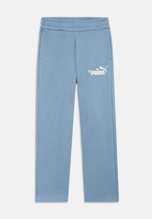 Pantalon de survêtement bleu clair en tissu doux avec une taille élastique. Présente un logo Puma blanc avec des accents floraux sur la cuisse gauche.