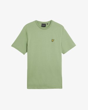 Camiseta de manga corta verde en una tela lisa, con un pequeño logo de un pájaro amarillo en el área izquierda del pecho. Diseño de cuello redondo.