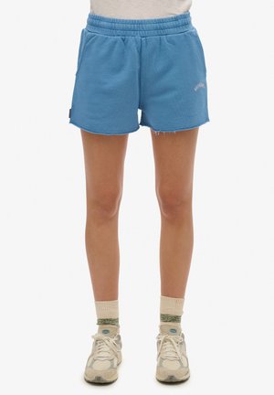 Blauwe katoenen shorts met een elastische tailleband en een rafelige zoom. Voorzien van zijzakken en een klein geborduurd logo aan de voorkant.