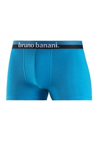 Blauwe katoenen boxershorts met een zwarte tailleband waarop "bruno banani" in witte letters staat. Gladde textuur en een aansluitend ontwerp.