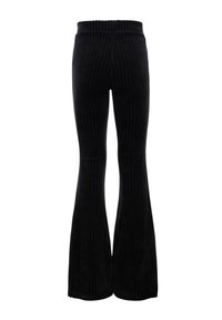 Zwarte corduroy flared broeken met verticale ribbels en een elastische tailleband, met een nauwsluitend bovenstuk en een licht uitlopende onderkant.