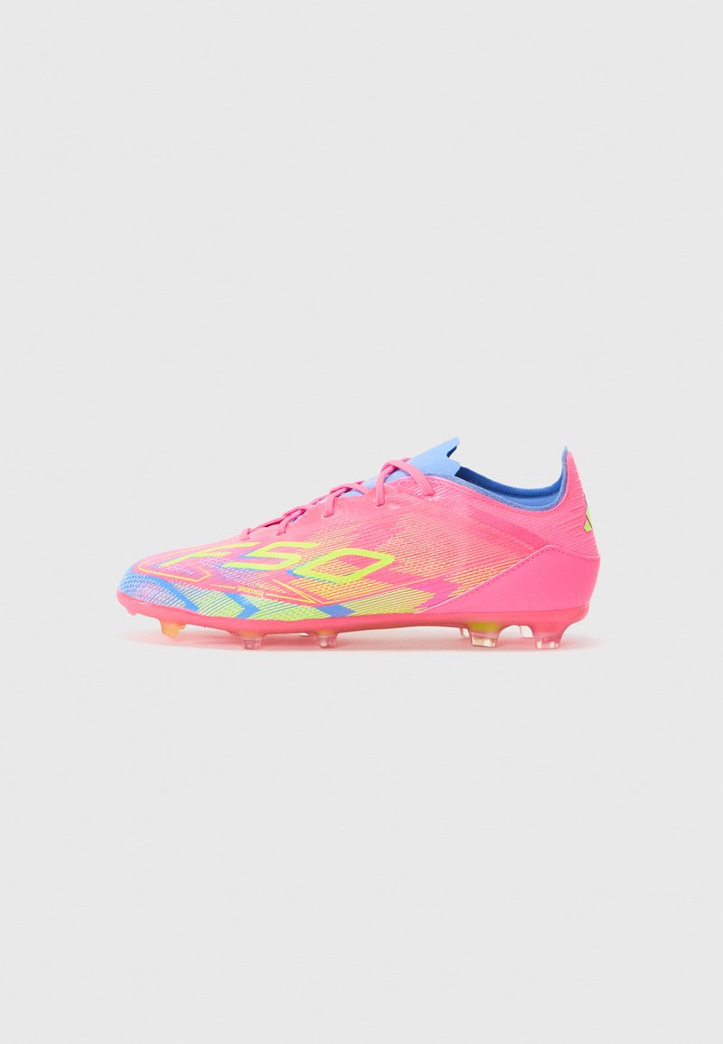 Bright pink football boots with a textured upper, blue accents, and a multi-colored graphic design. Transparent outsole with studs for traction.