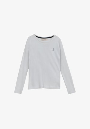 Camicia bianca in cotone a maniche lunghe con collo rotondo, caratterizzata da un piccolo logo blu navy sul lato sinistro del petto e da una texture liscia e morbida.