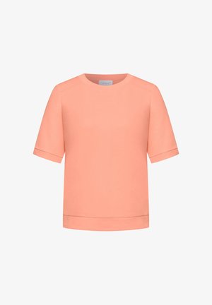 Kortærmet lyserød bluse med rund halsudskæring og manchetærmer, vist på hvid baggrund.