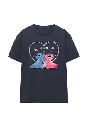 Navy t-shirt featuring a blue and pink lizard back-to-back inside a pink heart with stars, planets, and "Cosmic Connection" text.