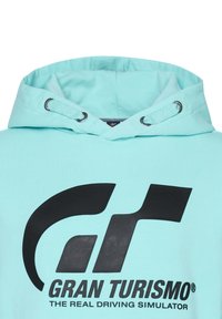 Světle modrá mikina z bavlny se šňůrkovou kapucí, na přední straně s velkým černým logem "Gran Turismo".