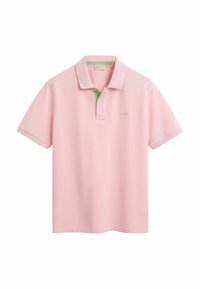 Světle růžová polokošile s zeleným límečkem a krátkým rukávem. Na levé části hrudi má malé logo. Vyrobena z měkké tkaniny.
