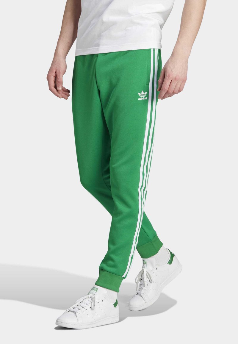 adidas Originals ADICOLOR CLASSICS SST - Tracksuit bottoms - green ...