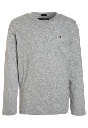 Lysegrå langærmet bomuldsskjorte med rund hals og lille Tommy Hilfiger-logo på venstre side af brystet.