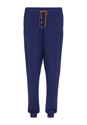 Pantalones jogger azul marino con cordón naranja y tres botones de madera en la cintura, con puños elásticos y bolsillos laterales.