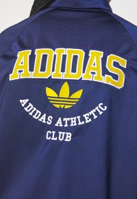 adidas Originals COLLEGE TRACK - Summer jacket - dark blue