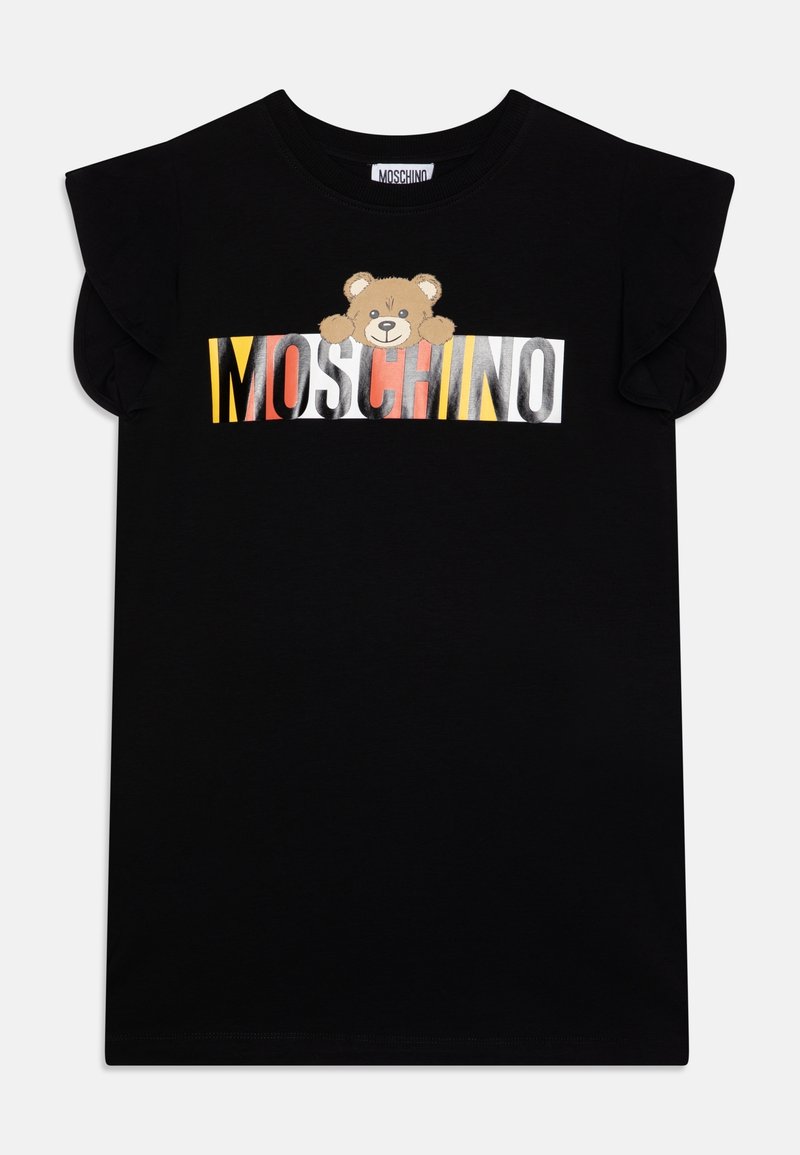 Chemise noire à manches courtes avec épaules volantées, texte multicolore "MOSCHINO" et un ourson qui dépasse des lettres sur la poitrine.