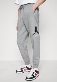 Jordan BASELINE PANT - Trainingsbroek - carbon heather/black