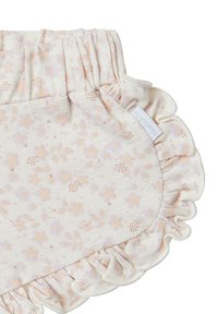 Cremefarbene Babybloomers mit elastischem Bund, weichem Stern- und Blumenmuster sowie Rüschenbesatz an den Beinöffnungen.