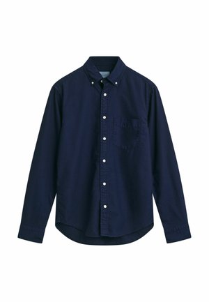 Camicia button-up blu navy in cotone; presenta un colletto button-down, maniche lunghe e una tasca sul petto. Texture liscia, design classico.