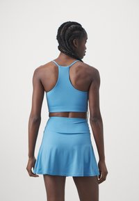 Girlfriend Collective FLOAT CLEO HALTER BRA - Sportski grudnjak s blagom potporom - surf