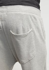 TOM TAILOR DENIM Pantalon de survêtement - mottled grey