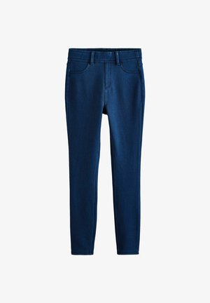 Tmavě modré denimové legíny s přiléhavým střihem, které mají pět kapes a poutka na pásek, hladkou texturu a kontrastní švy.