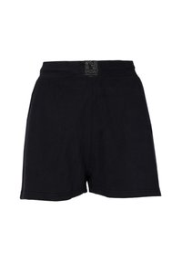 Black shorts made of soft fabric, featuring a slightly elastic waistband and a tag labeled "NASSAU BEACH CLUB" on the back.