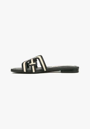 Black slide sandal with a thick, woven strap featuring a geometric pattern and a cream accent. Flat sole with subtle texture.
