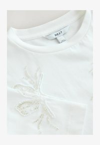 Sélectionné, white