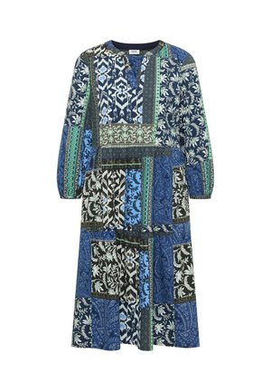 Long-sleeve midi dress with mixed blue, green, white, and black floral and geometric patchwork patterns and a round neckline with a small V cut.