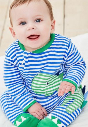 Gestreepte blauwe en witte pyjama met groene accenten, voorzien van een dinosaurus-applicatie en stekelige details op de voeten. Zachte stoftextuur.