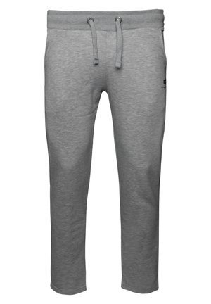 Graue Sweatpants aus weichem Material, mit einem elastischen Bund und Kordelzug sowie schmal zulaufenden Beinen. Kleines Logodetail in der Nähe der Hüfte.