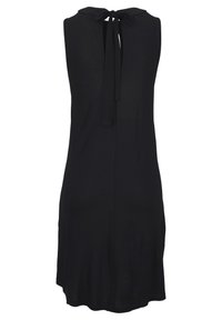 Sleeveless black dress with a keyhole back and tied bow at the neckline, knee-length with a simple, smooth fabric.